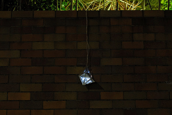 Group: Unreachable Diamond <br> Chan Man Yee / Chan Sze Yu <br> Installation detail <br><br>Ads for luxury items that decorate the streets are like a diamond that hangs at unreachable heights.
